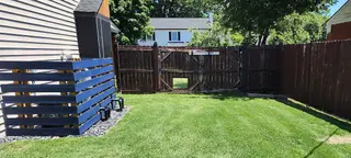 Freshly mowed residential lawn with clean edging